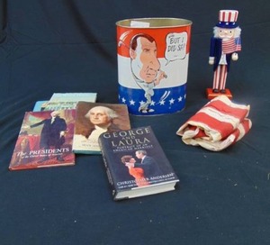 lot 732 image: Vintage American Political GOP Nixon Metal Tin Trashcan Tennis, Books, Nutcracker Lot Marks Consignments