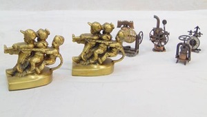 lot 733 image: Solid Brass Kids Tug of War Bookends & Lot of Small Pencil Sharpeners Marks Consignments