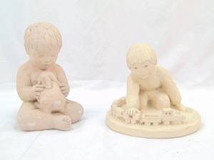 lot 752 image: Miro Musulin 72 Statuary Sculpture of boy w Bunny 9 & Austin Sculpture