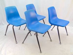 lot 832 image: Set of 4 Molded Plastic Stackable Standard Size Chairs