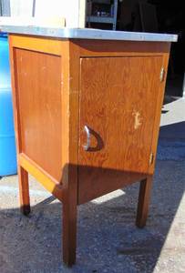 lot 853 image: Wood Cabinet with Long Legs & Laminate Top