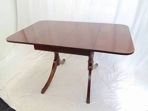 lot 268 image: Timeless Classic Drop Leaf Dining Table with Extra Leaves Under Table & Table Protector