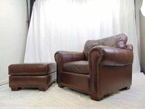 lot 459 image: Genuine Leather Brown Lounge Chair and Ottoman