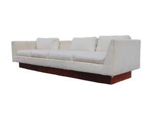 lot 246 image: Mid Century Vintage Extra Long Ivory Sofa with Wood Base by Carl Kisabeth
