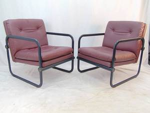 lot 17 image: Pair of Raspberry Vinyl & Black Metal Sculptural Chairs