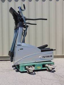 lot 10 image: TRUE ESX Cardio Eliptical Machine - Working Very Nice