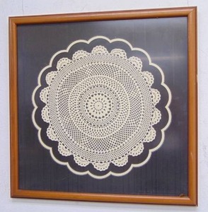 lot 204 image: Lace Doily Framed