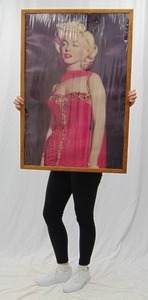 lot 215 image: Framed Poster of Marilyn Monroe (Still has Plastic Wrap over it)