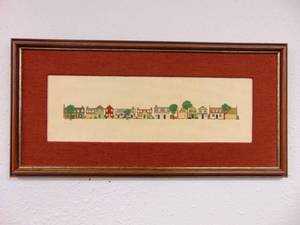 lot 115 image: Framed Cross Stitch of Cute Houses (Locally Made)