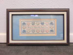 lot 122 image: Home is Where the Heart Lives Handmade Cross Stitch Framed with Glass