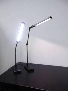 lot 337 image: Two Linear Minimalistic LED Desk Lamps - Working - Showroom
