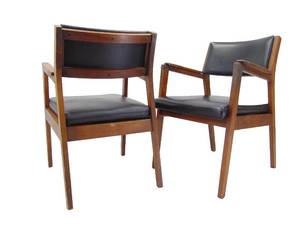 lot 63 image: Pair of Black Vinyl Mid Century Chairs