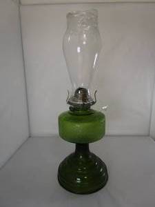lot 243 image: Antique Green Glass Oil Lamp Kerosene Grand Rapids Light Co.