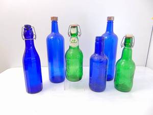 lot 300 image: Lot of Blue & Green Glass Bottles
