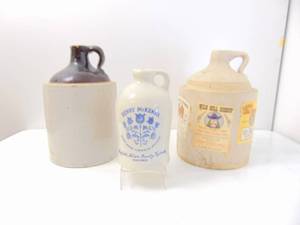 lot 319 image: Vintage Stoneware Whiskey Jugs