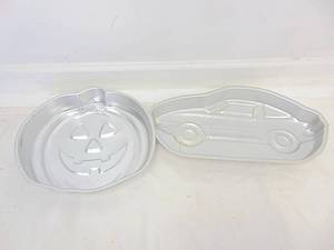lot 331 image: Vintage Racecar & Jack-o-lantern Cake Molds