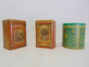 lot 379 image: Tin Containers