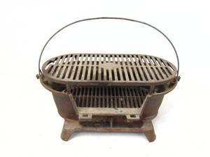 lot 106 image: LODGE Cast Iron Sportsman Grill -