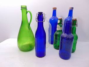 lot 370 image: Lot of Colored Glass Bottles
