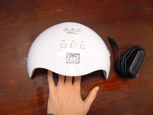 lot 511 image: UV Light with Cables for Drying Nails Gel Nail Dryer - Working