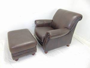 lot 67 image: Modern Black Vegan Leather Chair with Ottoman