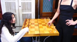 lot 130 image: Giant Vintage Wood Chess Board with Chess Pieces