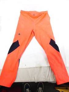 lot 389 image: UnderArmour OrangeBlack 78 Length Leggings- Sz S