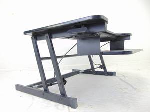 lot 105 image: Sit Stand Gas Spring Desk