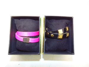 lot 325 image: Pair of Rustic Cuff Wrap Bracelets in Pink and Black
