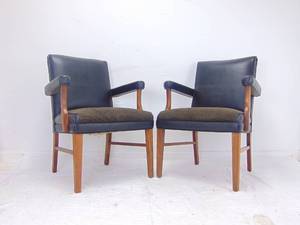 lot 22 image: Pair of Vintage Mid Century Black Arm Chairs with Solid Walnut Legs