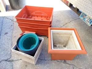 lot 320 image: Lot of Planters and Large Rolling Planters - Hello Spring