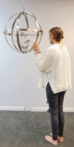 lot 57 image: Brushed Nickel Sphere 6-Light Modern Chandelier
