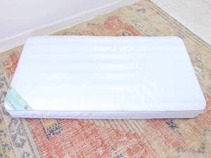 lot 662 image: Kolacraft Crib and Toddlers Mattress- New Hypoallergenic and Waterproof Cover Binding- 2.25 x 4.35