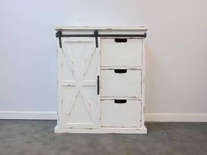 lot 201 image: White Farmhouse Cabinet with Sliding Door- HOBBY LOBBY