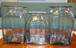 lot 234 image: Set of Three Fluted Glass Candle Jars