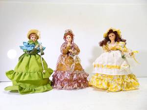 lot 244 image: Brinns Musical Edition Collectible Dolls- Set of Three