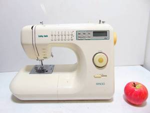 lot 181 image: Sazuki BABY LOCK BL9500 Sewing Machine with Cute Cat Protective Case