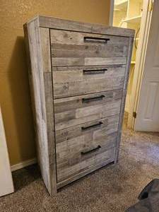 lot 410 image: Tallboy Farmhouse Style Dresser by Ashley Furniture