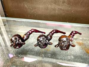 lot 207 image: Lot of Three Vintage Resin Pipes with Buddah Face