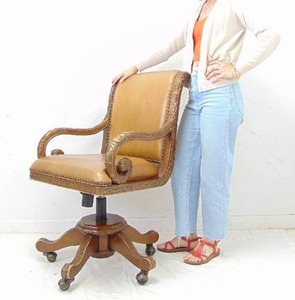 lot 176 image: Handsome and Stately Executive Chair with Genuine Leather and Carved Wood Detailing by HOOKER Furniture