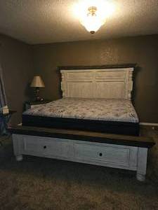 lot 337 image: Havalance by ASHLEY King or Queen Size Panel Storage Bed with Mattress Included