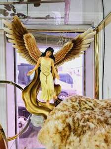 lot 96 image: Flying Angel Figurine and Fur
