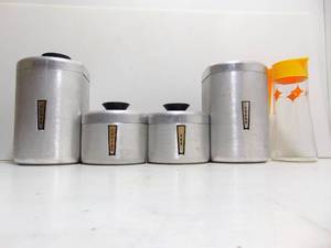 lot 468 image: Vintage Mid Century Stackable Food Canisters (KROMEX) and Glass Juice Bottle