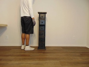 lot 531 image: Tall and Slender Black Cabinet Tower with Drawers