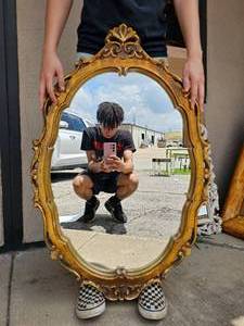 lot 131 image: Oval Ornate Gold Framed Mirror
