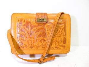 lot 542 image: Hand-Tooled Vintage Leather Mexican Purse with Agave and Portrait