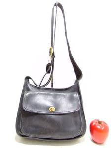 lot 115 image: COACH VINTAGE BLACK LEATHER TAFT BAG 9980