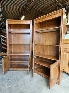 lot 373 image: Pair of wood cabinets with glass shelves