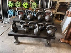 lot 51 image: TKO Kettle Bell Rack with Multiple Kettle Bells