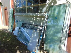 lot 348 image: Large Pcs of Glass and Really Nice Commercial Door and misc